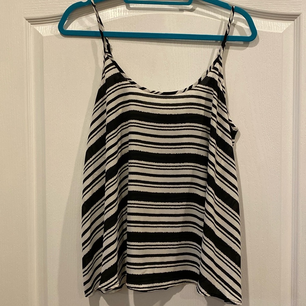 Black and white sleeveless blouse